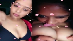 Telugu girl topless sucking her own big boobs MMS